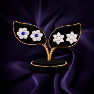 92.5 Sterling Silver floral stud earrings with blue center and clear stones