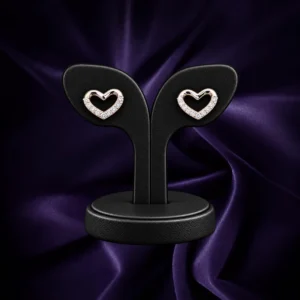Heart-shaped 92.5 sterling silver stud earrings with clear stone detailing