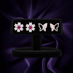 92.5 sterling silver butterfly and floral stud earrings with clear stone detailing