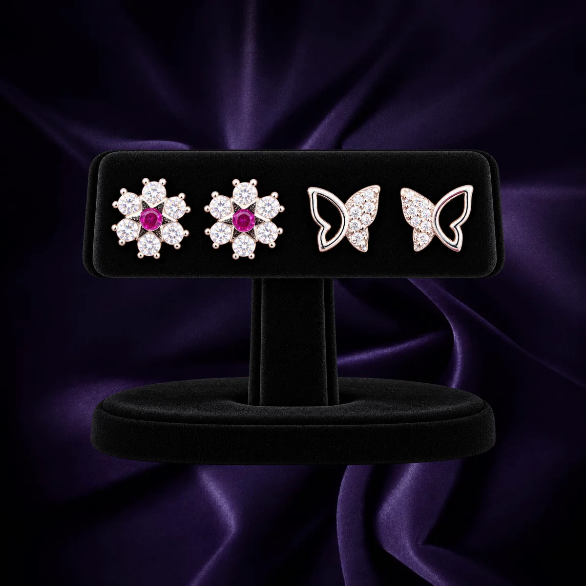 92.5 sterling silver butterfly and floral stud earrings with clear stone detailing