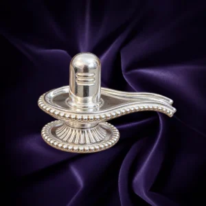 Silver Shiva Lingam idol with ornamental Yoni base